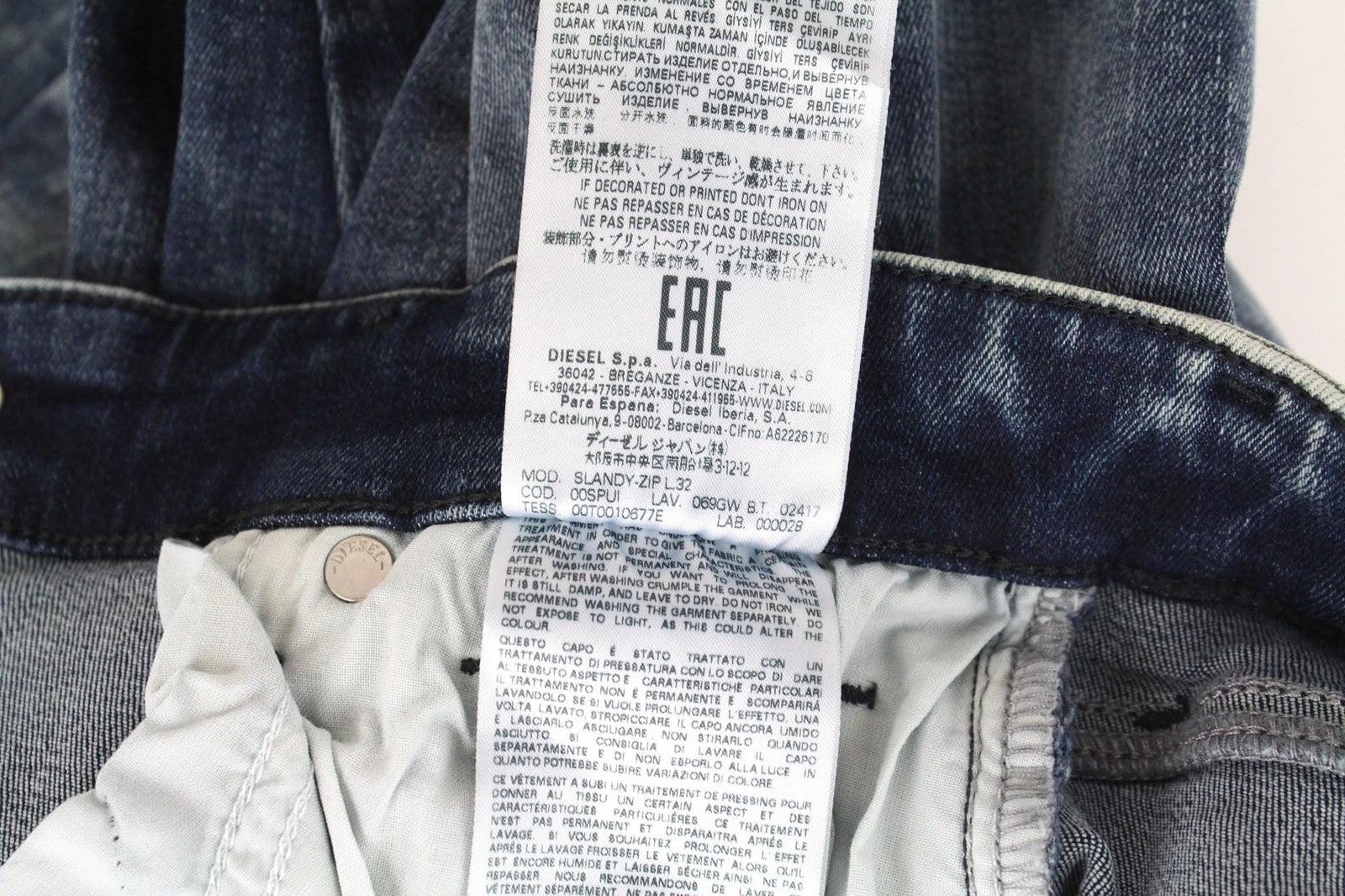 DIESEL Slandy-Zip 069GW moteriški džinsai W25/L32 vidutinio mėlynumo, aptempti, tamprūs 