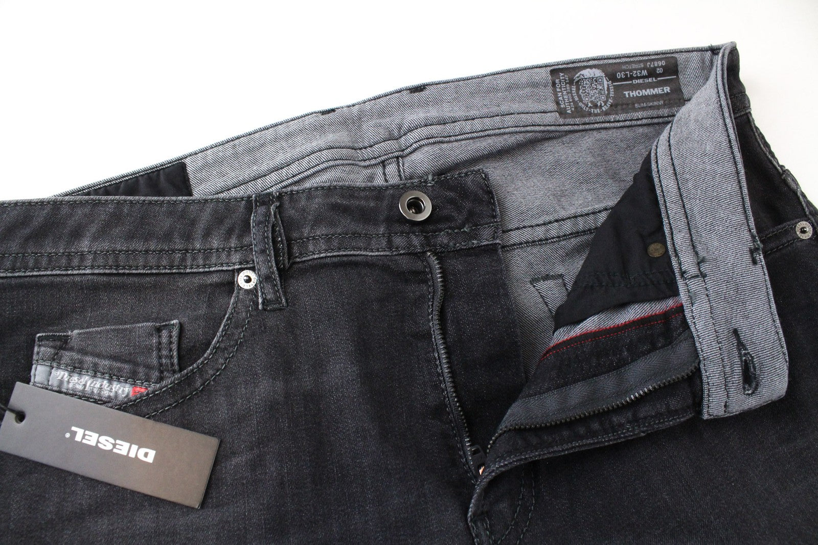 DIESEL Thommer 0687J vyriški džinsai W32/L30 tamsiai pilki tamprūs medvilniniai Slim-Skinny džinsai 
