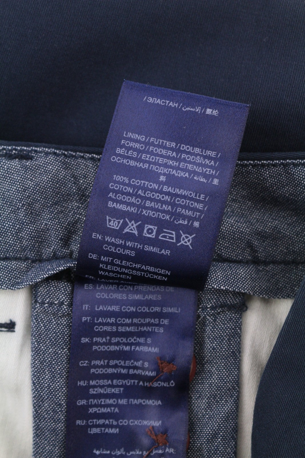 GANT klasikinės trumpintos chino stiliaus moteriškos kelnės, 36 dydžio, tamsiai mėlynos, priglundančios, su užtrauktuku ir logotipu 