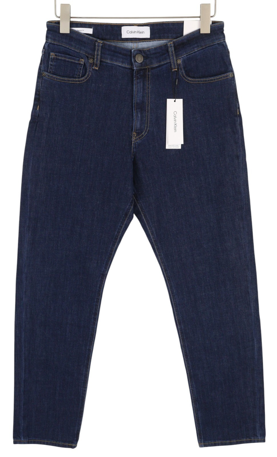 CALVIN KLEIN siaurėjantys džinsai su rinse mėlyna spalva, W30/L30, tamsiai mėlyni, su užtrauktuku ir logotipu. 