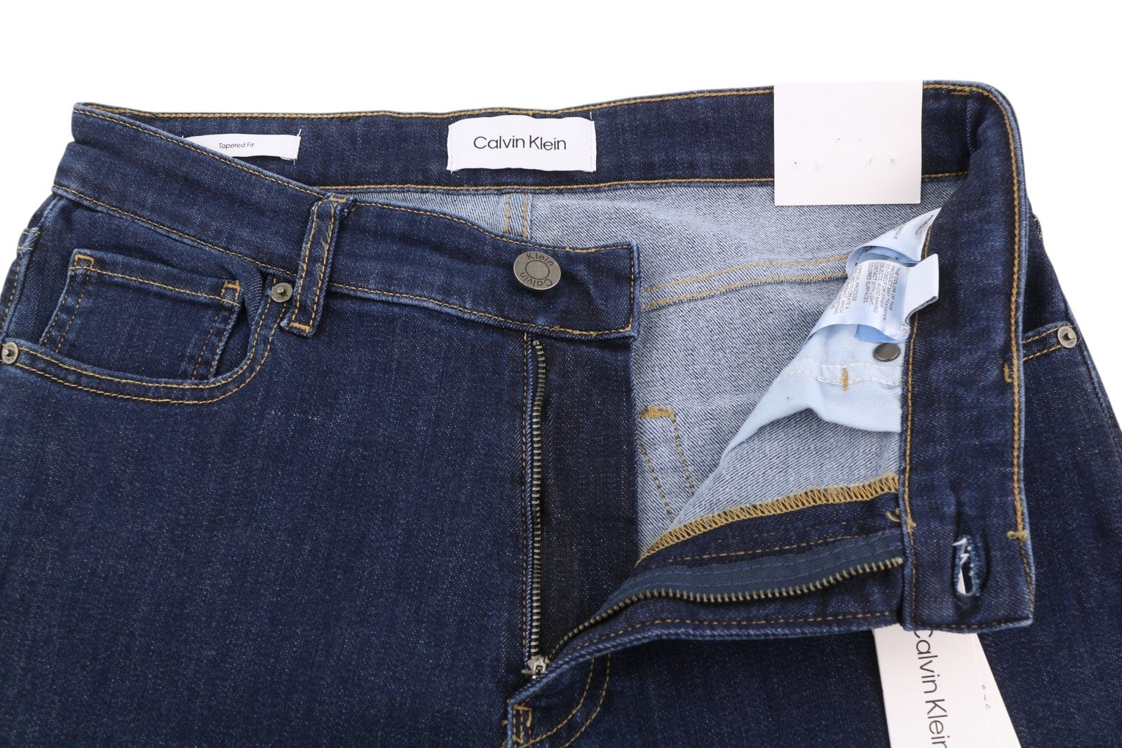 CALVIN KLEIN siaurėjantys džinsai mėlyna spalva, W30/L30, tamsiai mėlyni, su užtrauktuku ir logotipu. 