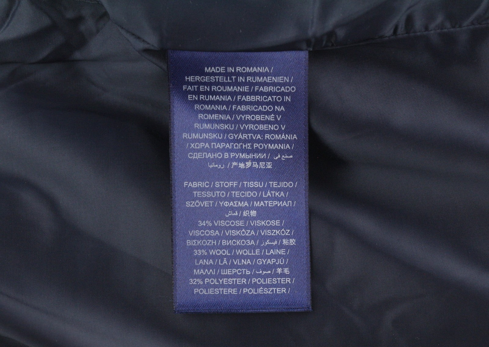 GANT Plaunamos vilnonės siaurėjančios moteriškos kelnės su tamsiai mėlynu užtrauktuku, klasikinės 