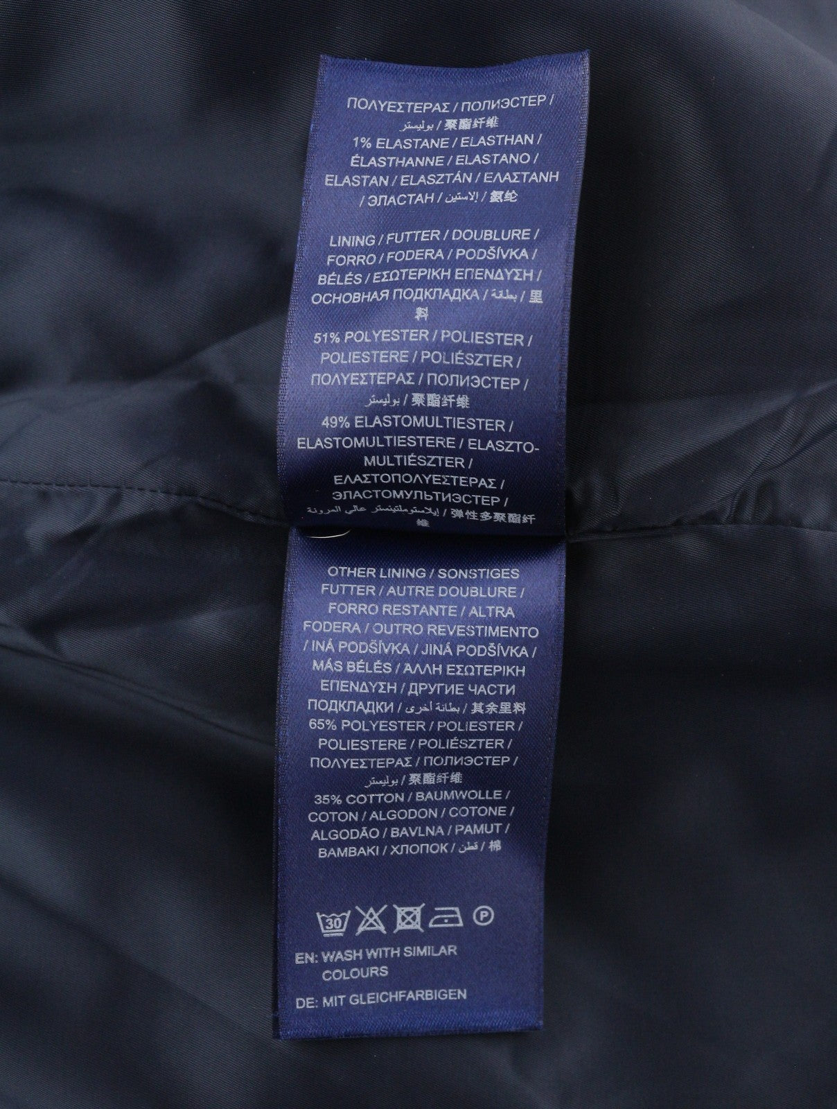 GANT Plaunamos vilnonės siaurėjančios moteriškos kelnės su tamsiai mėlynu užtrauktuku, klasikinės 