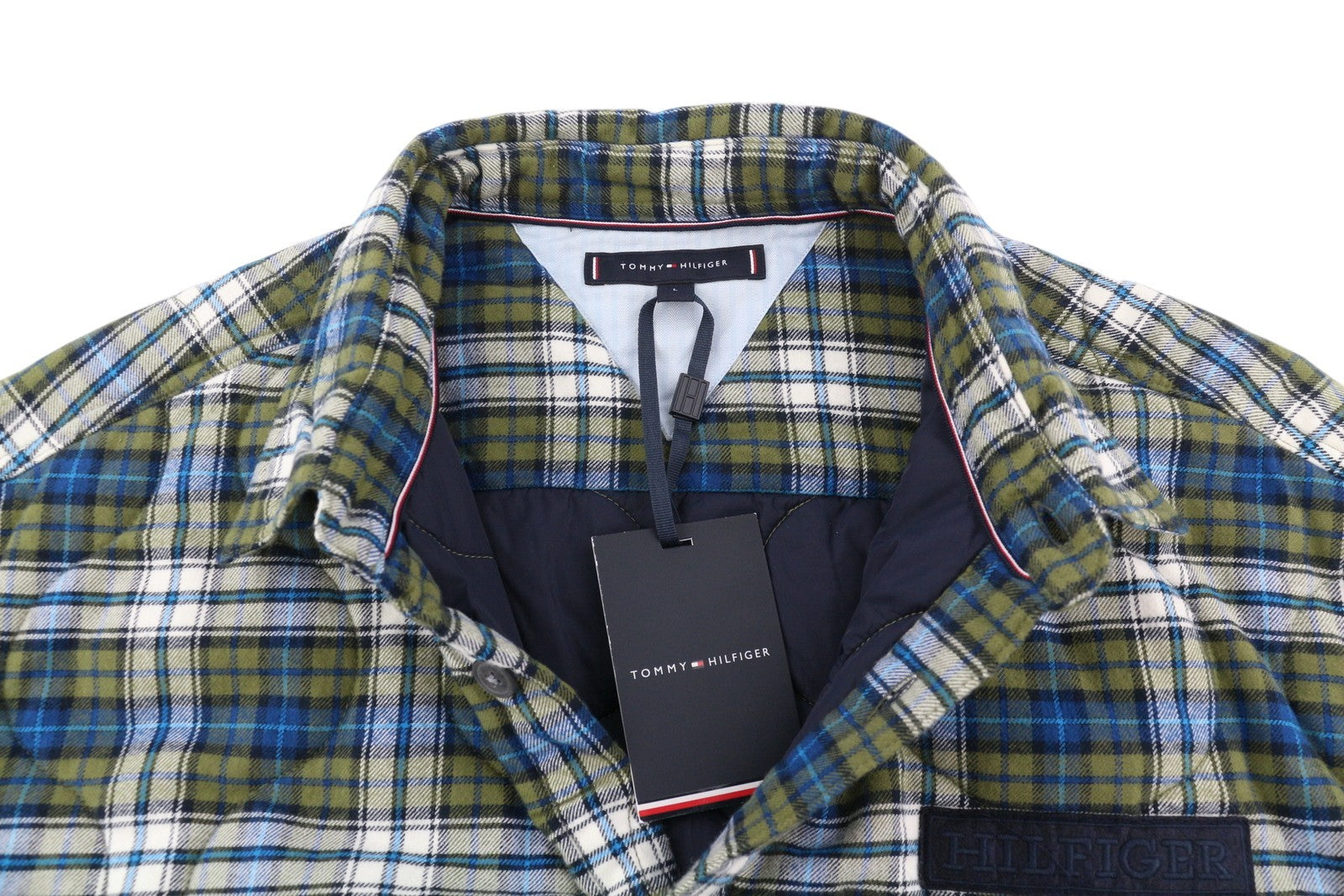 TOMMY HILFIGER languotas dygsniuotas marškinėlių tipo vyriškas švarkas, L dydžio, su sagomis ir paminkštintu pamušalu. 