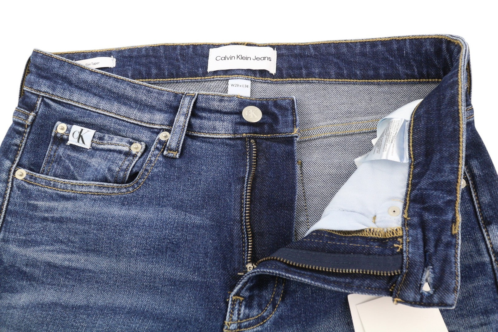 CALVIN KLEIN Slim Taper vyriški džinsai W29/L34 mėlyni, išblukę, plėšyti. 