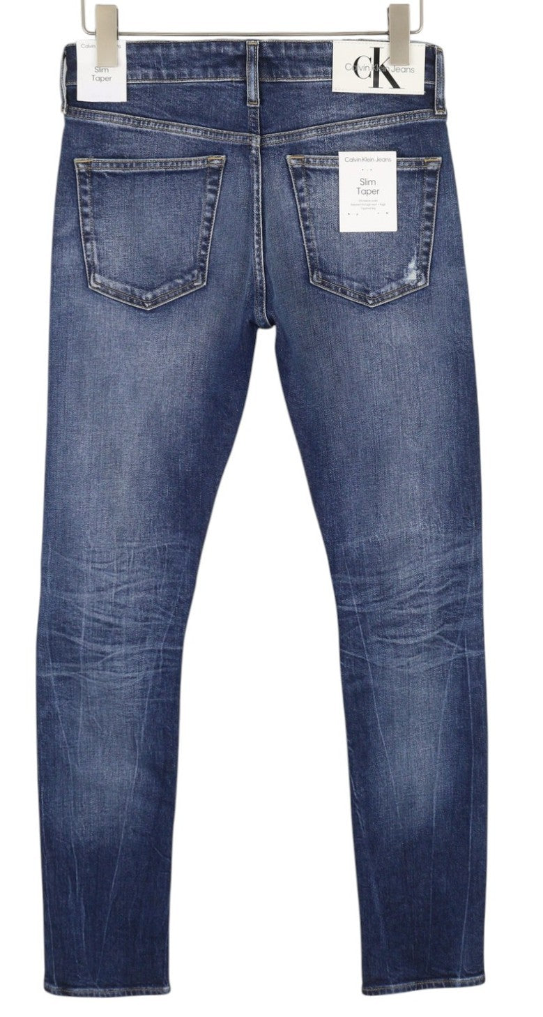 CALVIN KLEIN Slim Taper vyriški džinsai W29/L34 mėlyni, išblukę, plėšyti. 