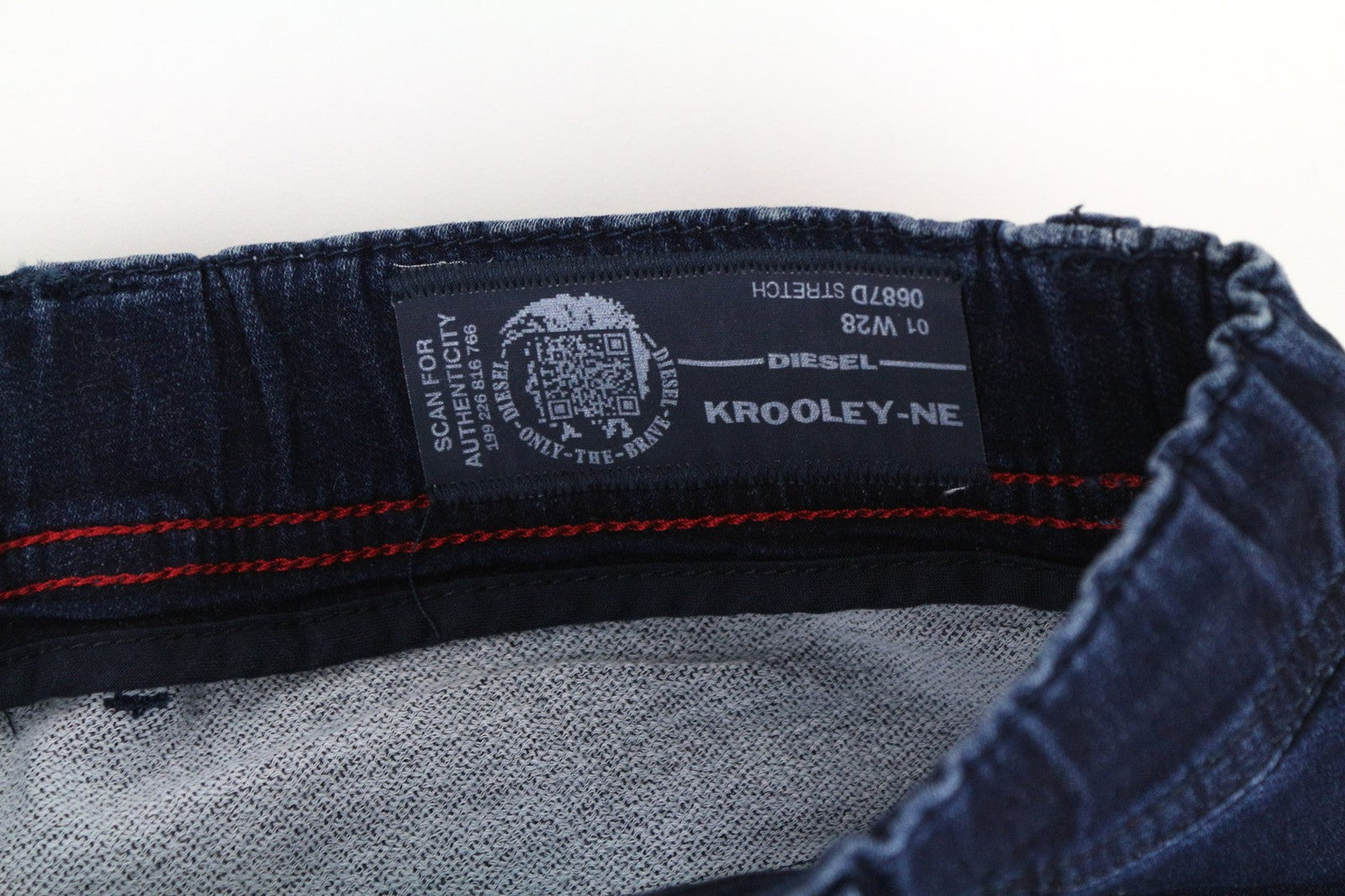 DIESEL Krooley-NE 0687D vyriški džinsai W28 mėlyni sportiniai Jogg Slim morkų spalvos medvilnės mišinio džinsai 