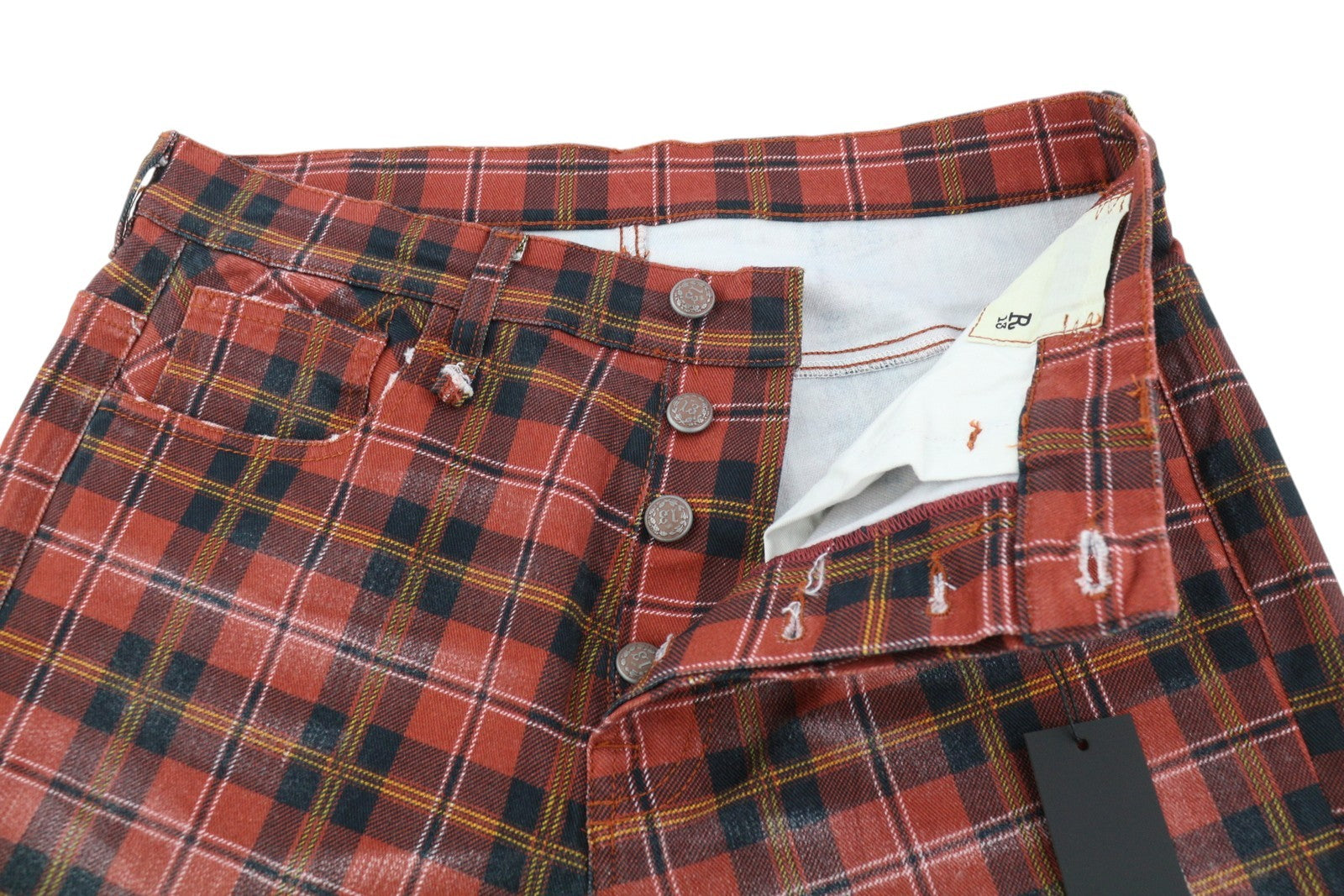 R13 Pasiūtos moteriškos kelnės 27 pelenų raudonumo, languotos, trumpintos, nuleistos iki kulkšnies ir tarpkojo. 