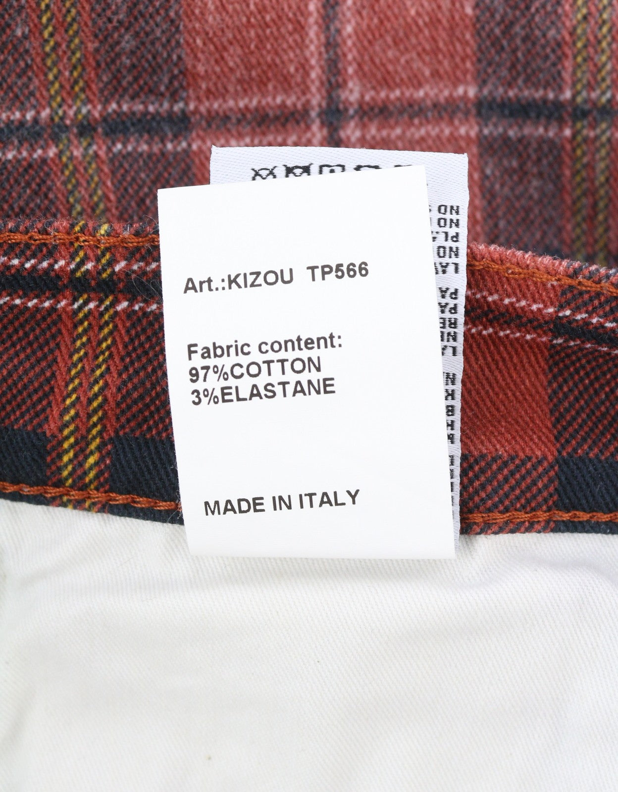 R13 Pasiūtos moteriškos kelnės 27 pelenų raudonumo, languotos, trumpintos, nuleistos iki kulkšnies ir tarpkojo. 