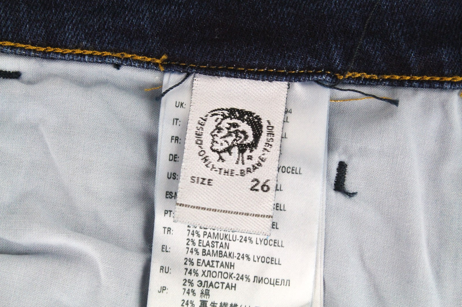 DIESEL D-Bazer 083AT džinsai W26/L30 tamsiai mėlyni siaurėjantys tamprūs džinsai su sagomis 