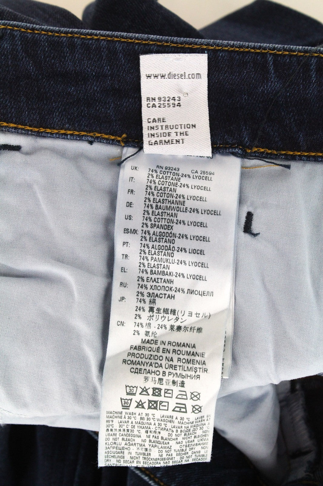 DIESEL D-Bazer 083AT džinsai W26/L30 tamsiai mėlyni siaurėjantys tamprūs džinsai su sagomis 