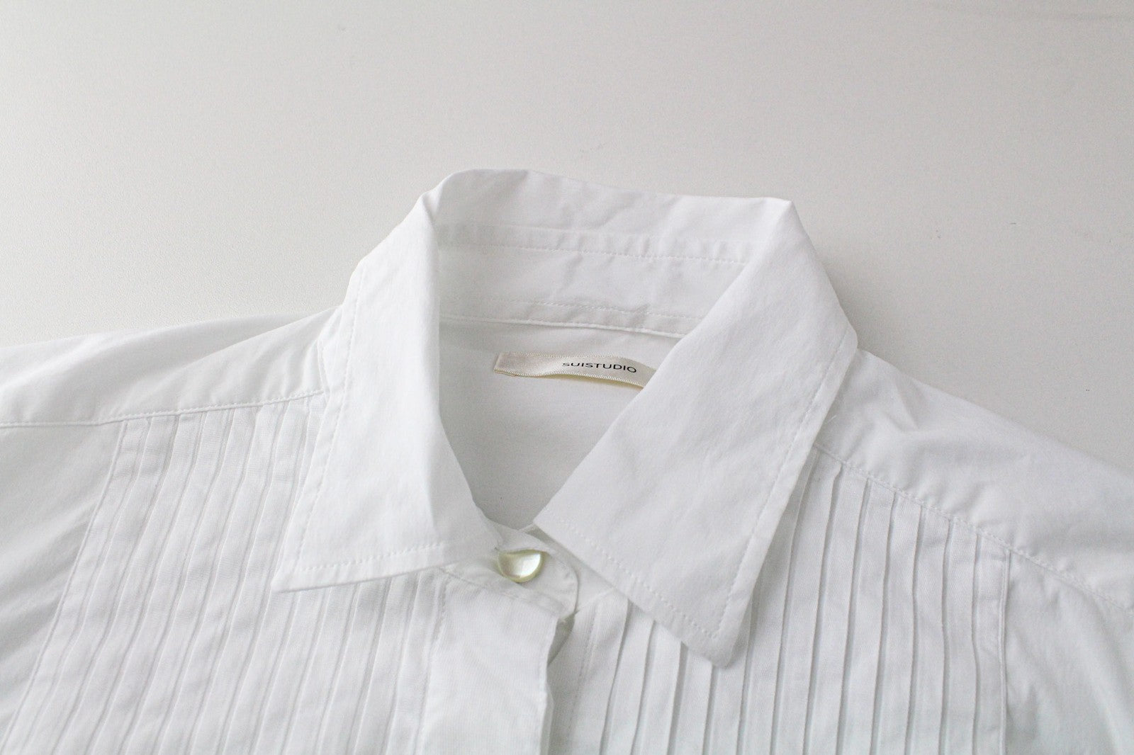 SUISTUDIO Dexter moteriški 36R balti medvilnės mišinio tamprūs marškinėliai ilgomis rankovėmis 