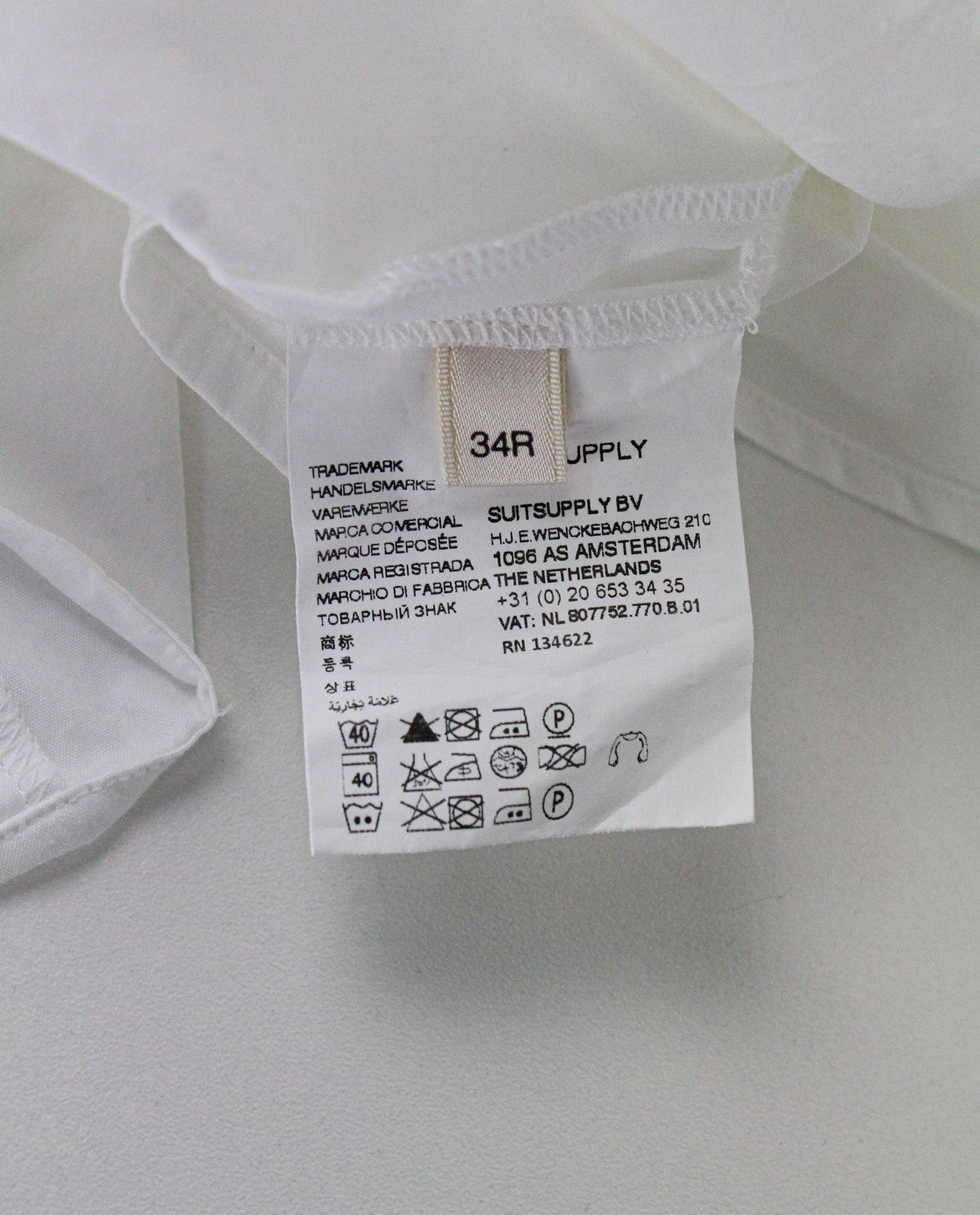 SUISTUDIO moteriška 34R balta berankovė medvilninio mišinio tampri palaidinė su užtrauktuku nugaroje 