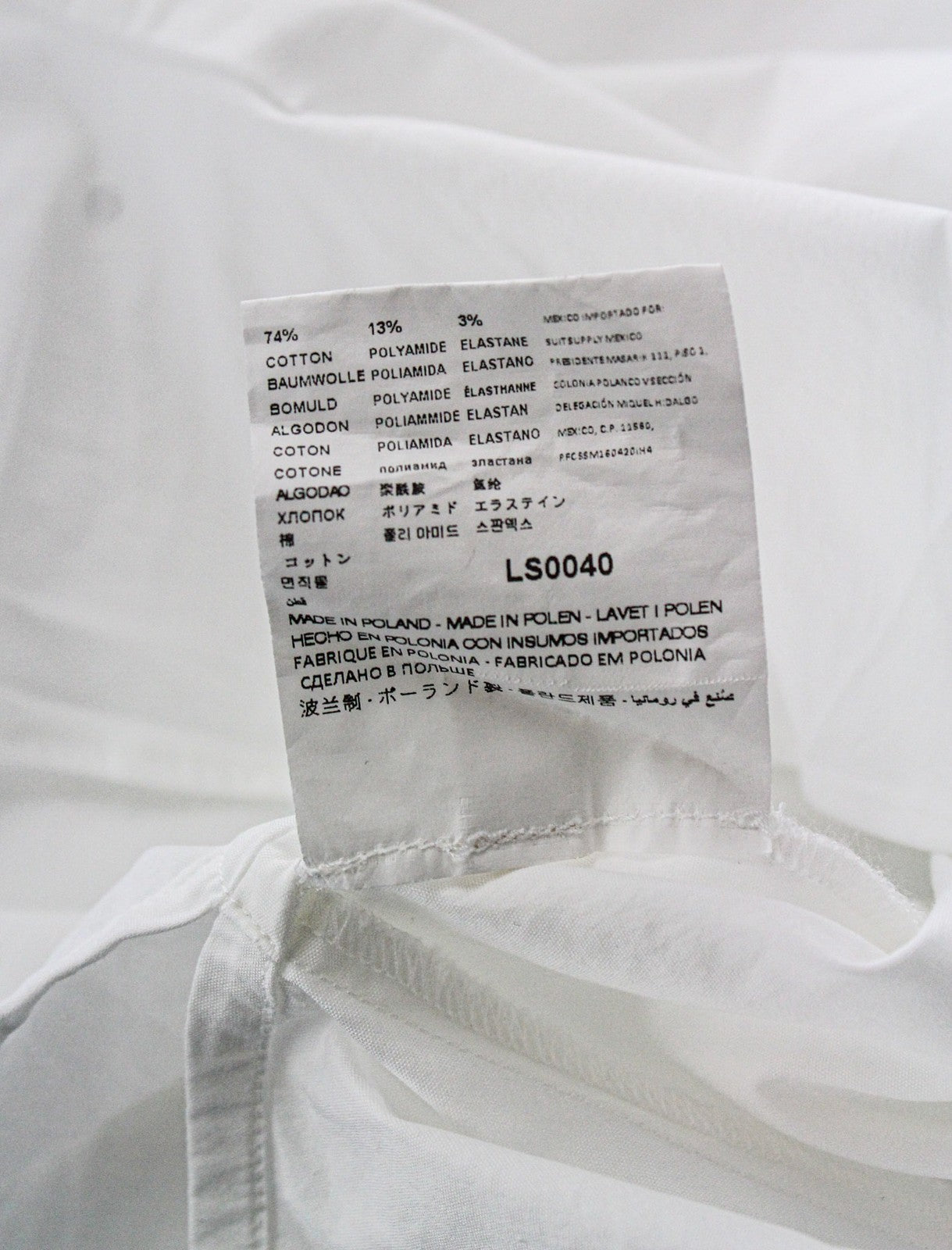 SUISTUDIO moteriška 34R balta berankovė medvilninio mišinio tampri palaidinė su užtrauktuku nugaroje 