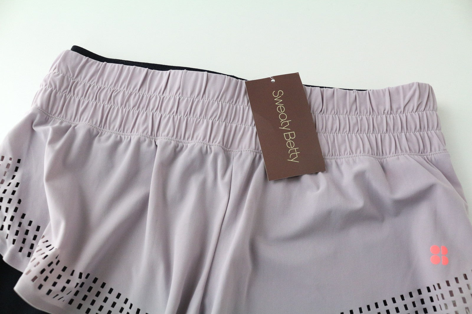 SWEATY BETTY Aerial 2in1 rožinės spalvos moteriškos šortai S dydžio, tamprūs, daugiasluoksniai, skirti šokių treniruotėms 