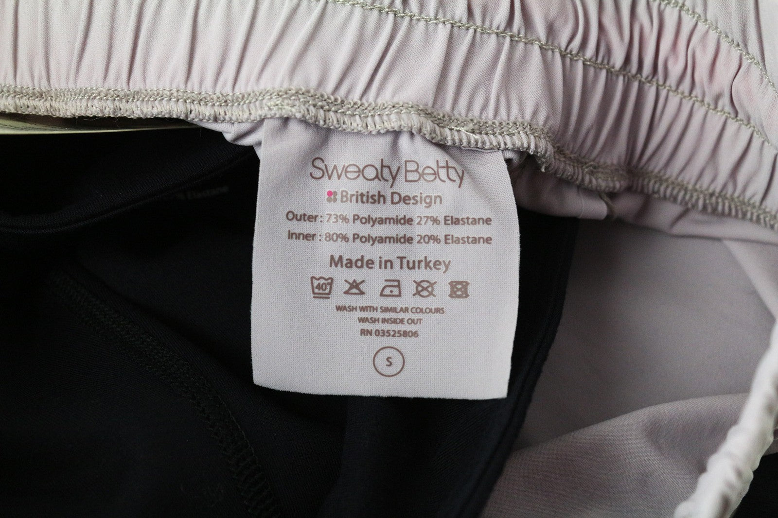 SWEATY BETTY Aerial 2in1 rožinės spalvos moteriškos šortai S dydžio, tamprūs, daugiasluoksniai, skirti šokių treniruotėms 