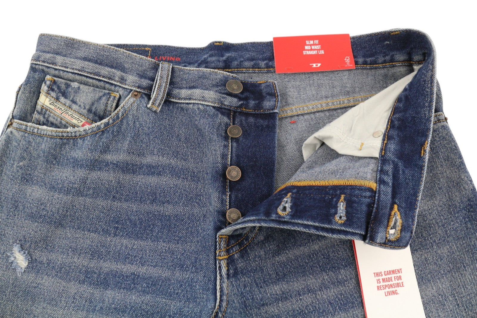 DIESEL 1995 09E02 vyriški džinsai W36/L32 mėlyni, plėšyti, prigludę, ploni. Rekomenduojama kaina – 375 USD. 