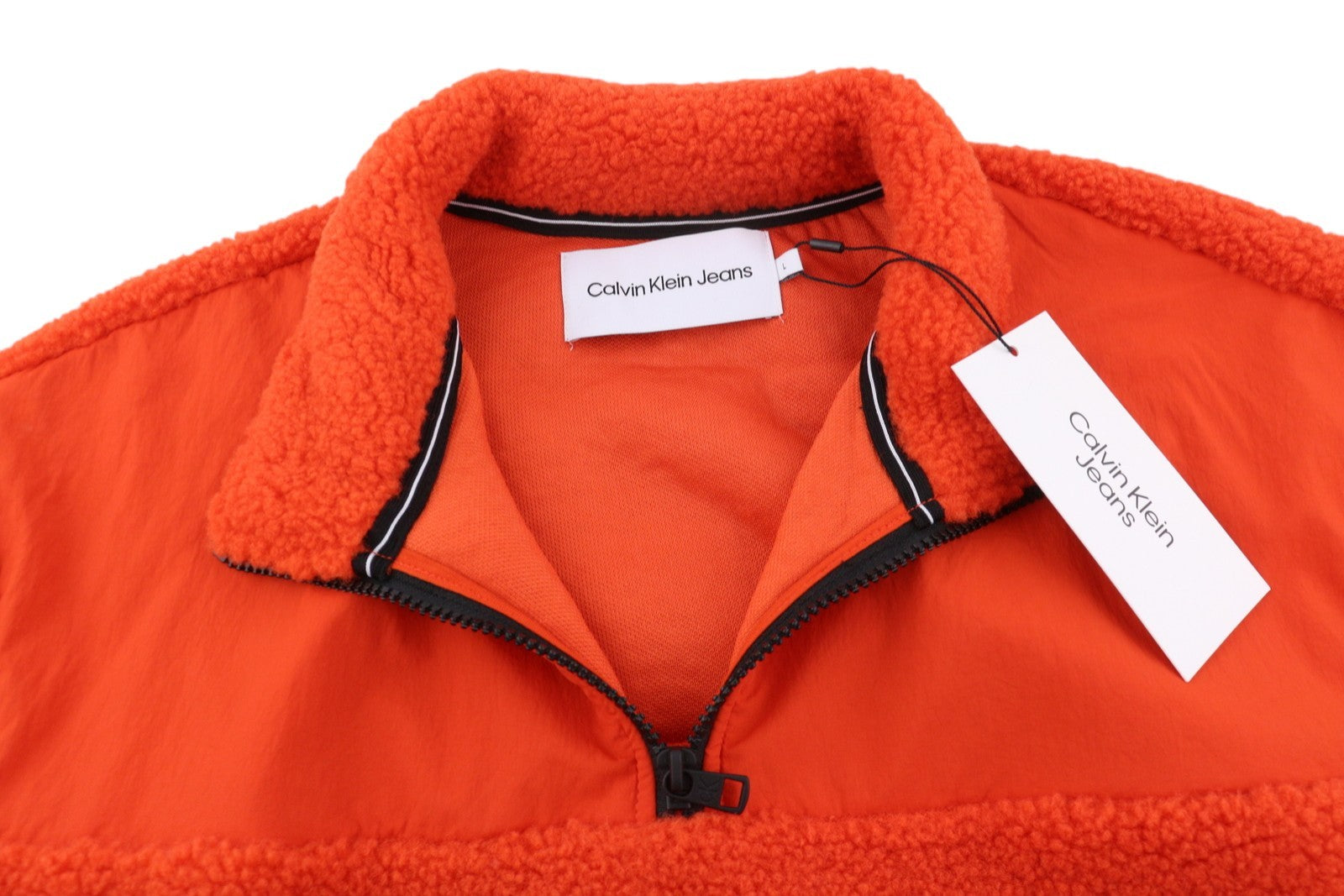 CALVIN KLEIN Badge Sherpa pusmėnulinis džemperis L dydžio oranžinis flisinis megztinis, rekomenduojama kaina – 129 € 