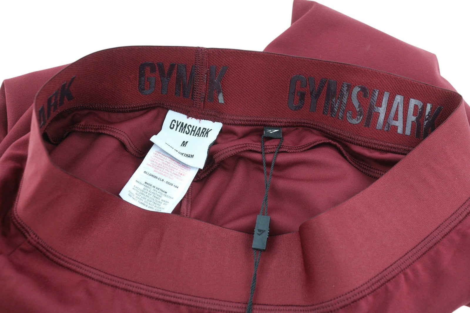 GYMSHARK moteriškos tamprės M bordo spalvos su elastingu juosmeniu, tampriu prigludusiu sportiniu logotipu 