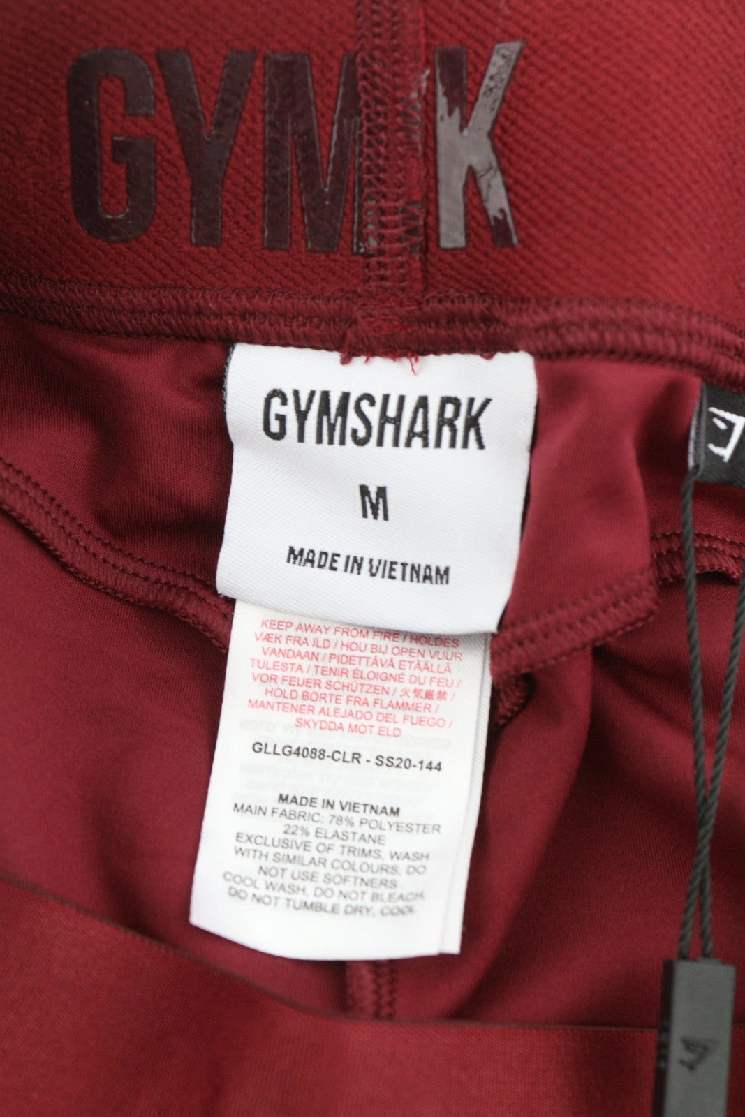 GYMSHARK moteriškos tamprės M bordo spalvos su elastingu juosmeniu, tampriu prigludusiu sportiniu logotipu 