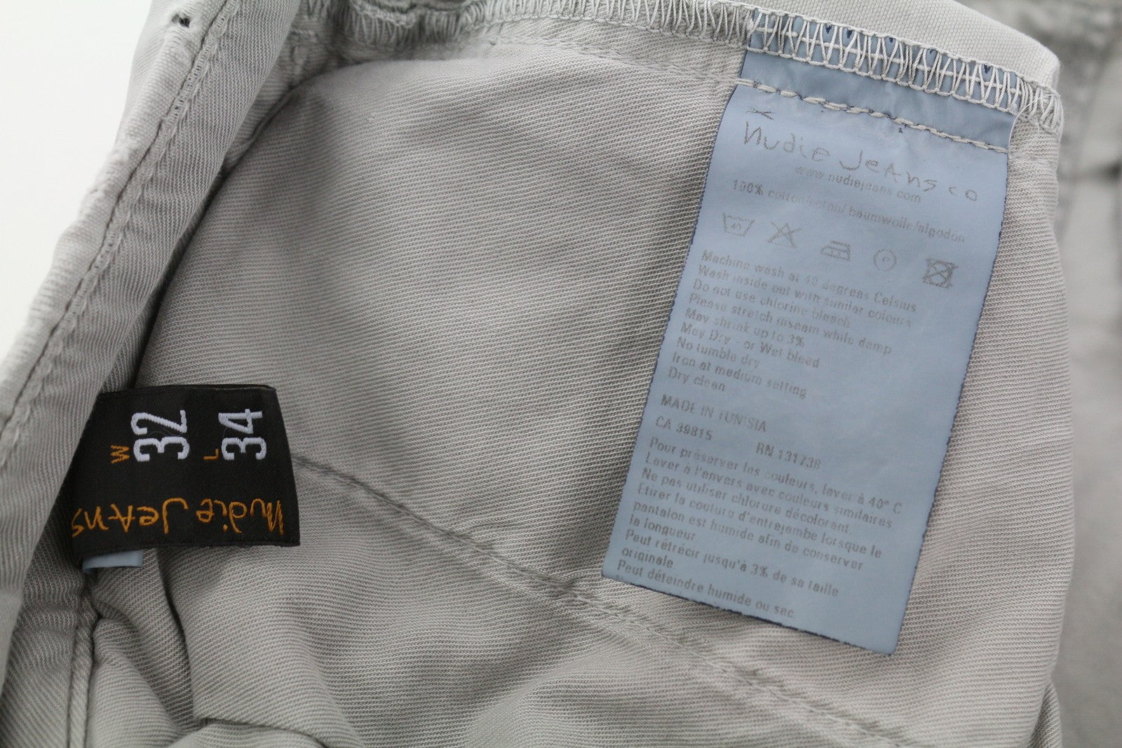 NUDIE JEANS Khaki spalvos įprastos vyriškos kelnės W32/L34 Organic Moon Dust Distressed 