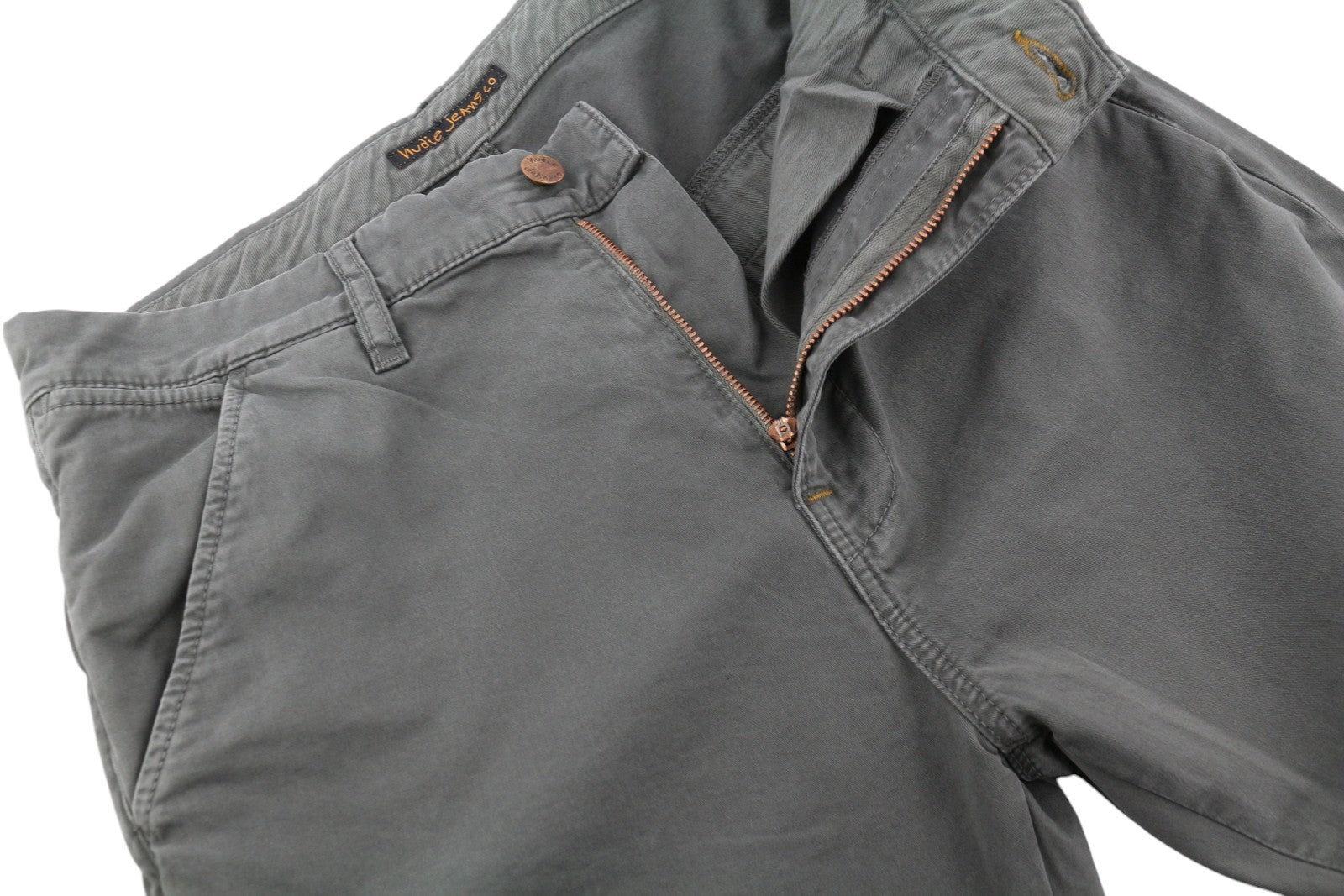 NUDIE JEANS Khaki spalvos plonos vyriškos kelnės W30/L32 Paloma Dust organinės spalvos chino užtrauktuku 