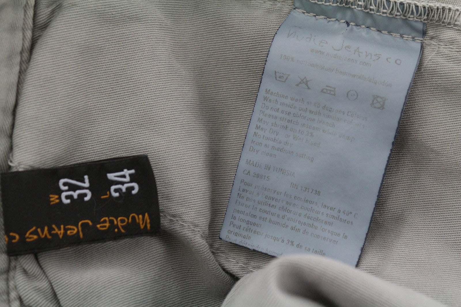 NUDIE JEANS chaki spalvos įprastos vyriškos kelnės W32/L34 Gey Moon Dust Distress Chino* 