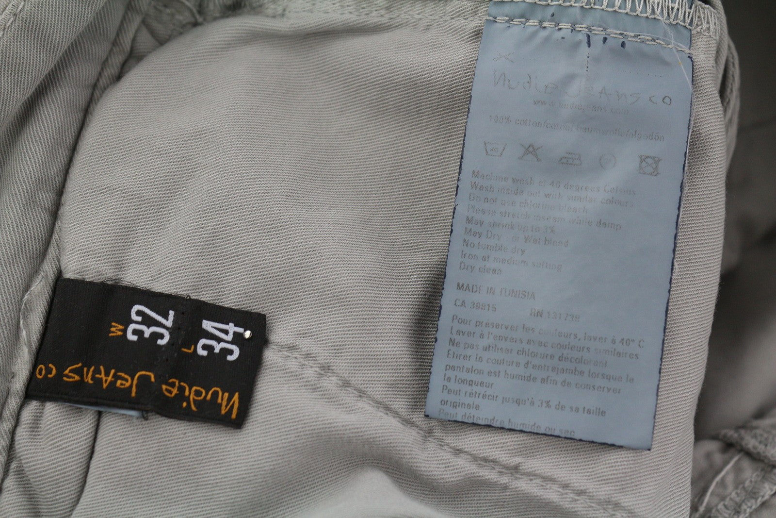 NUDIE JEANS Khaki spalvos įprastos vyriškos kelnės W32/L34 Organic Moon Dust Ripped Chino 