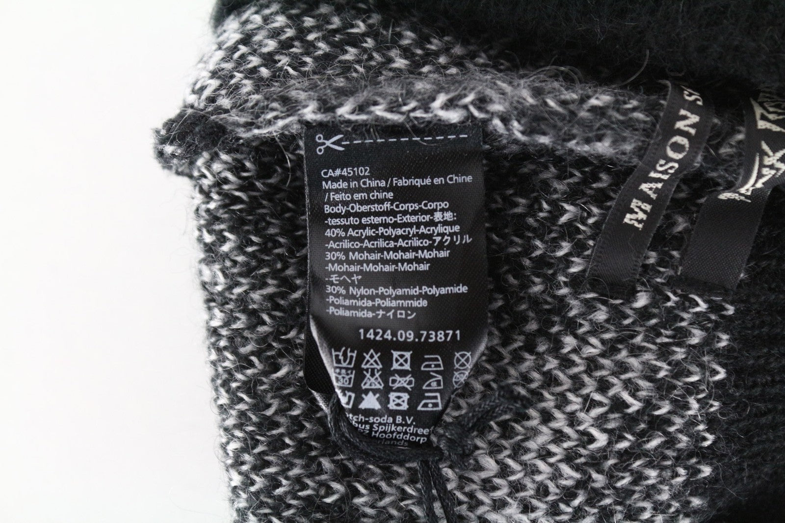 MAISON SCOTCH moteriškos šviesiai pilkos OS kepurės su žvaigždėmis ir moherio mišinio megztomis kepurėmis, 2 vnt. 