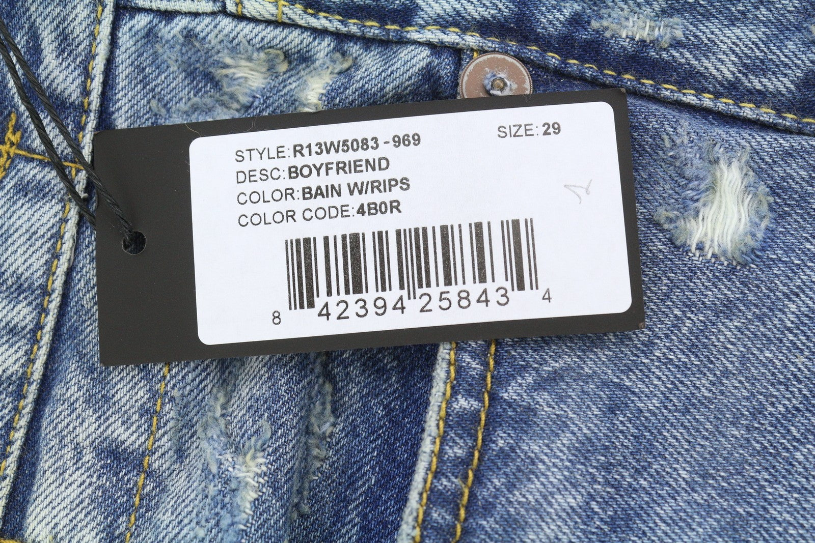 R13 Boyfriend moteriški džinsai, 29 m., su plėšytomis juostelėmis, išblukusiomis kulkšnimis, PS25, rekomenduojama mažmeninė kaina – 595 € 