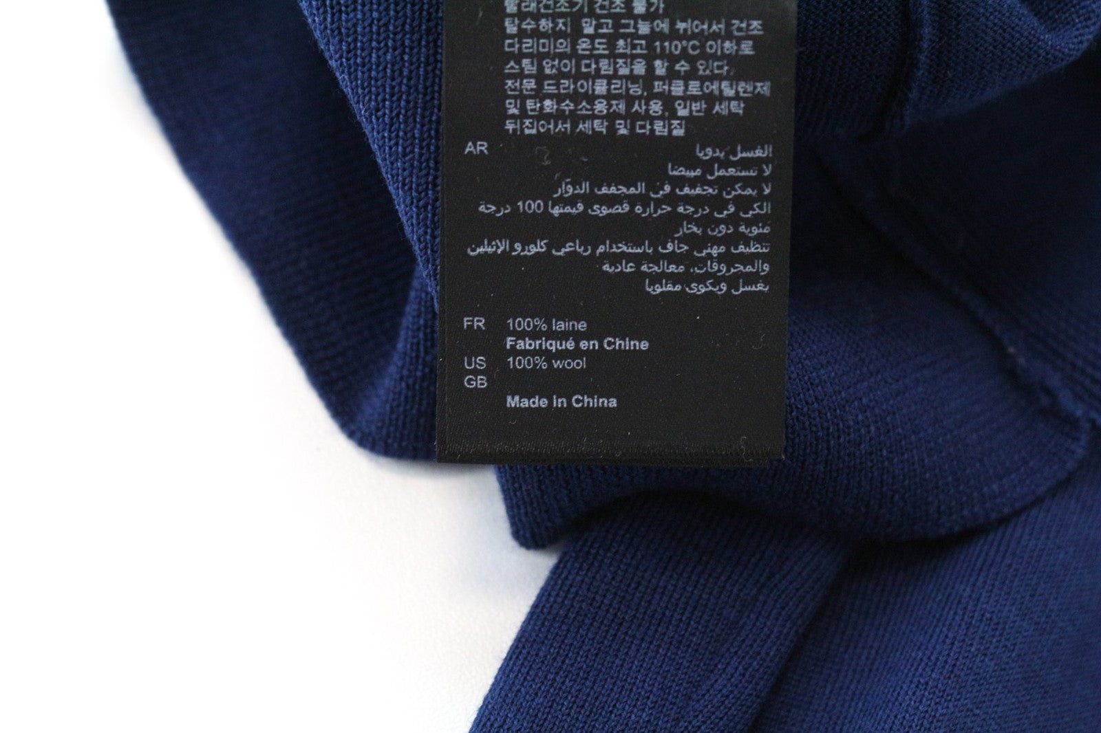 SANDRO vyriškas XS dydžio tamsiai mėlynas plonas grynos vilnos megztinis apvalia kaklo apykakle 