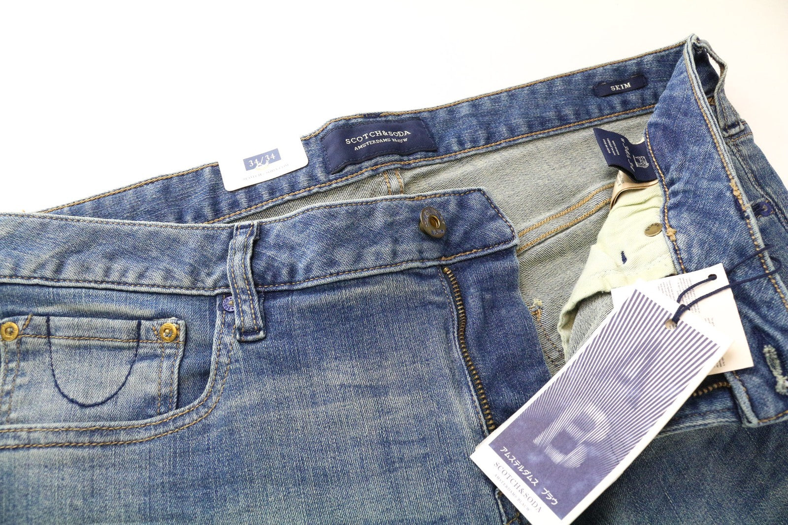 SCOTCH &amp; SODA Skim vyriški W34/L34 mėlyni aptempti tamprūs džinsai su užtrauktuku ir išblukusia juostele 