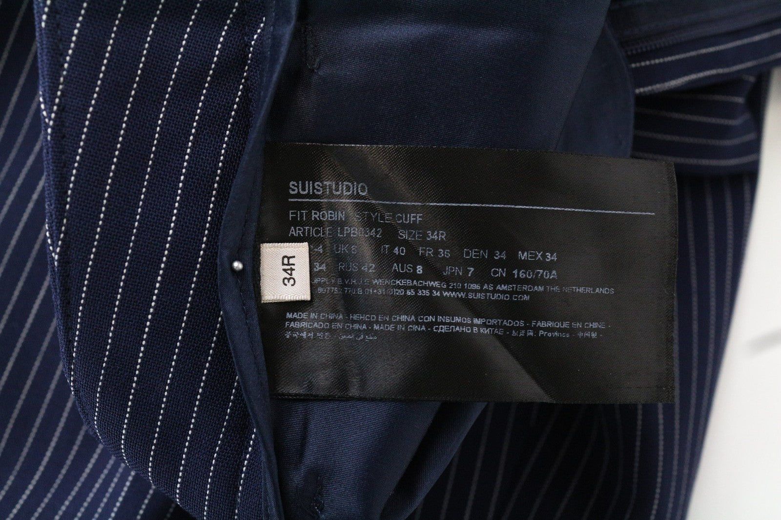 SUISTUDIO Robin moteriškos kelnės UK6R vilnonės dryžuotos mėlynos klostuotos plonos oficialios 