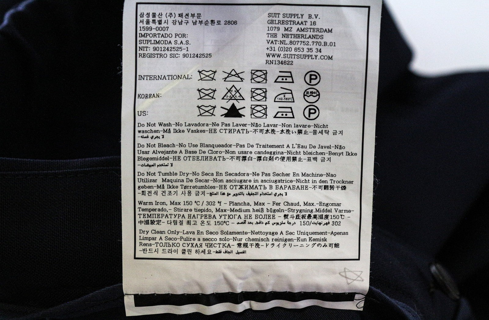 SUITSUPPLY Soho vyriškos kelnės UK34R mėlynos vilnos, plonos, klostuotos priekyje, pamušalu 