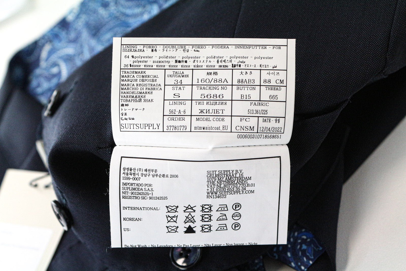 SUITSUPPLY Ferrara vyriška liemenė UK34S tamsiai mėlyna vilnonė vienaeilė su smailiu atvartu 