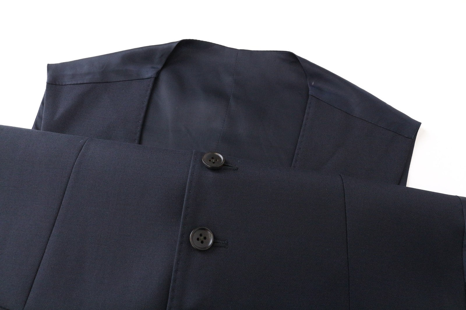 SUITSUPPLY Ferrara vyriška liemenė UK32R tamsiai mėlyna vilnonė V formos iškirpte, vienaeilė 