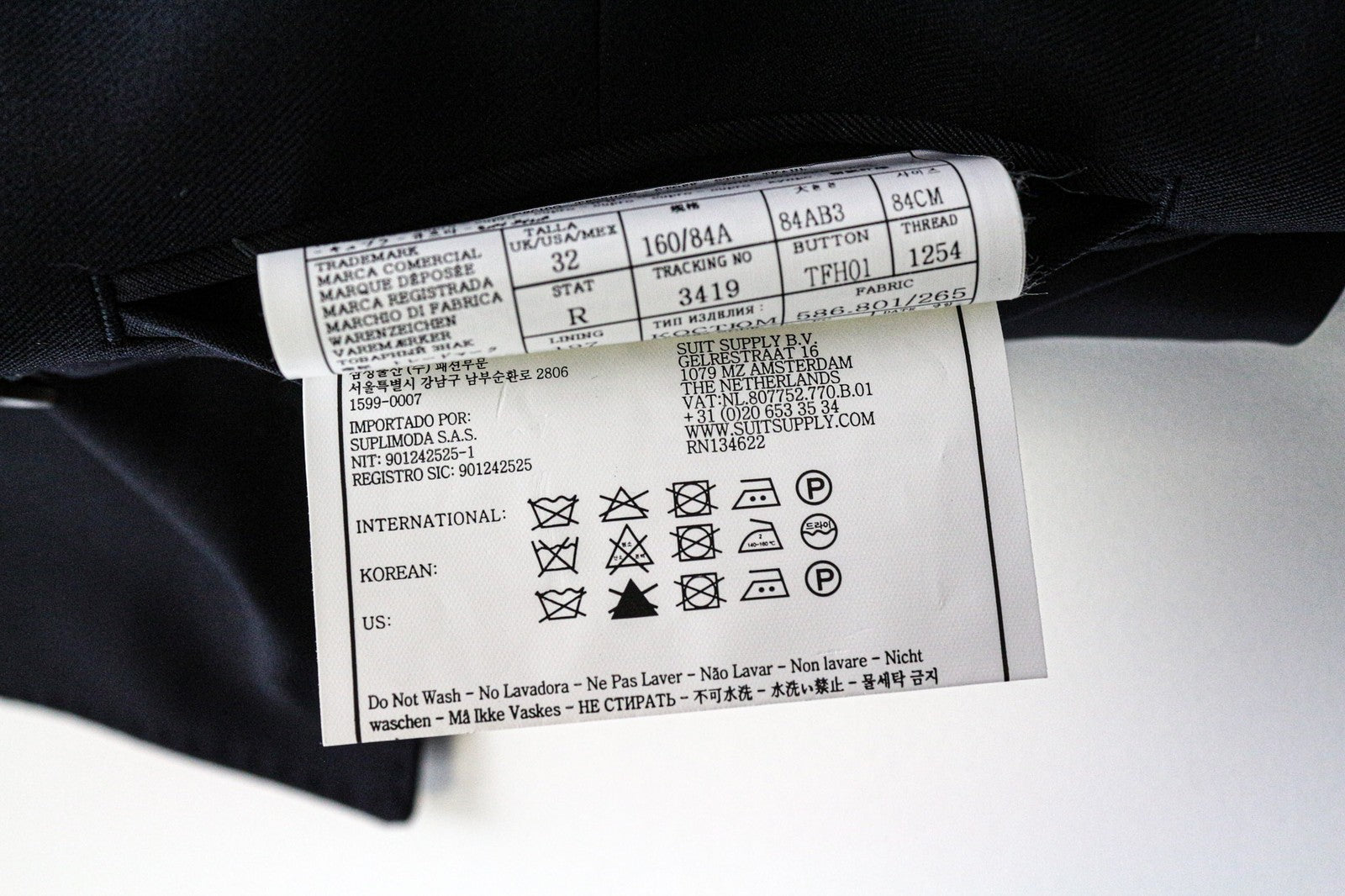 SUITSUPPLY Ferrara vyriška liemenė UK32R tamsiai mėlyna vilnonė V formos iškirpte, vienaeilė 