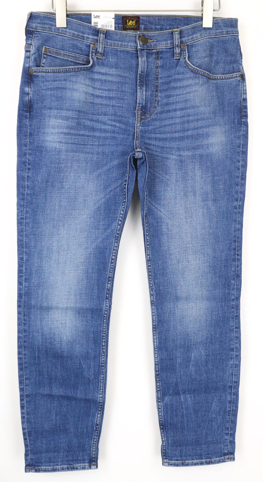 LEE Rider trumpinti vyriški džinsai W32/L34 vidutinio mėlynumo, tamprūs, ploni, klasikinio stiliaus, su užtrauktuku 