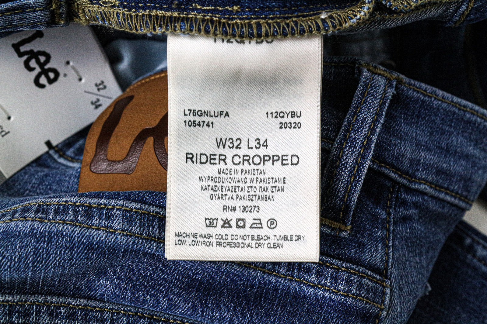 LEE Rider trumpinti vyriški džinsai W32/L34 vidutinio mėlynumo, tamprūs, ploni, klasikinio stiliaus, su užtrauktuku 