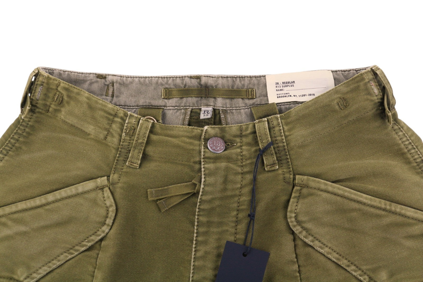 R13 moteriškos kelnės iki kulkšnies, 26, alyvuogių spalvos, dažytos drabužių logotipu, FW25, RRP1199 