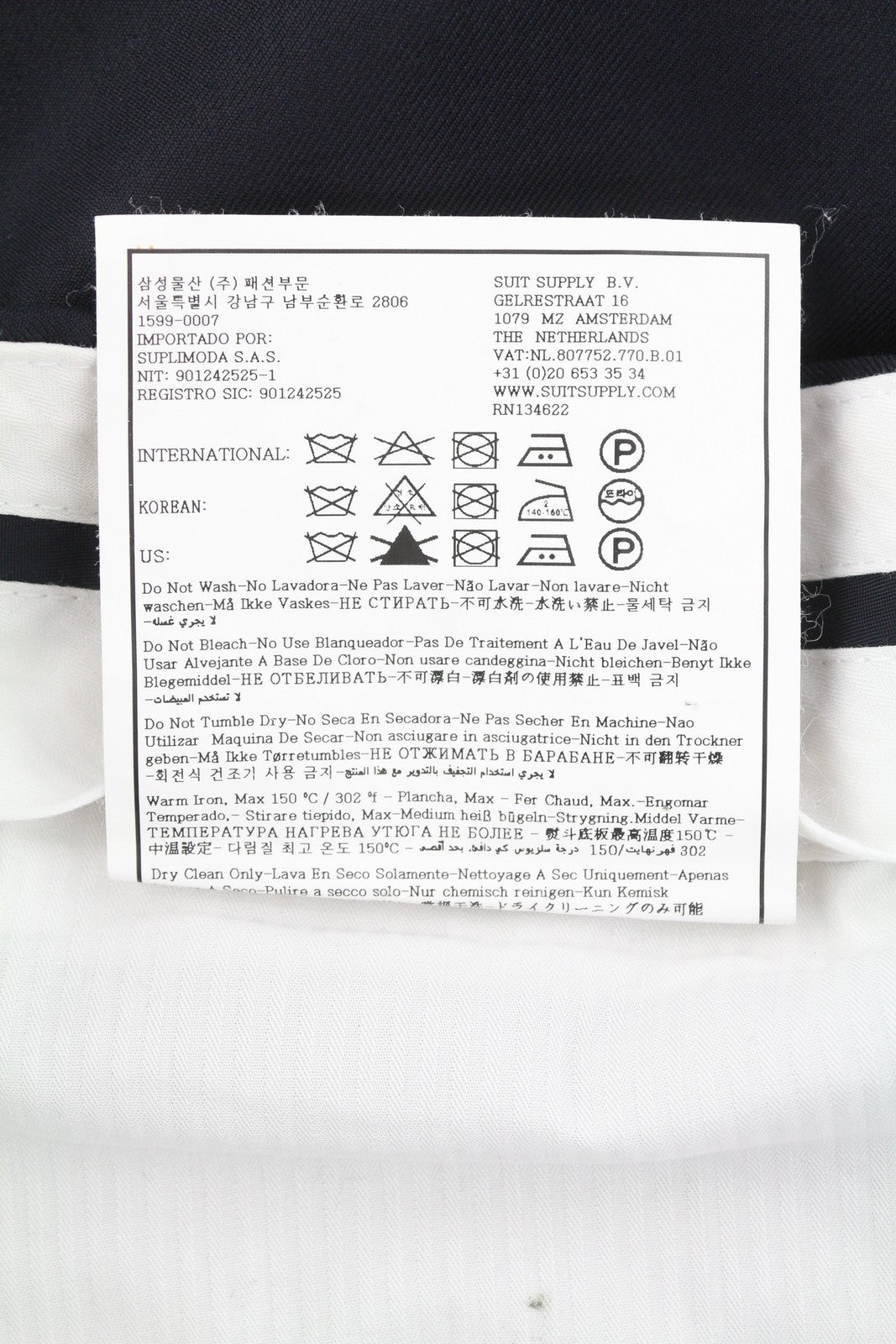 „SUITSUPPLY Soho SA“ vyriškos kelnės, UK44S, tamsiai mėlynos, vilnonės, siaurėjančios, oficialios, su užtrauktuku. 