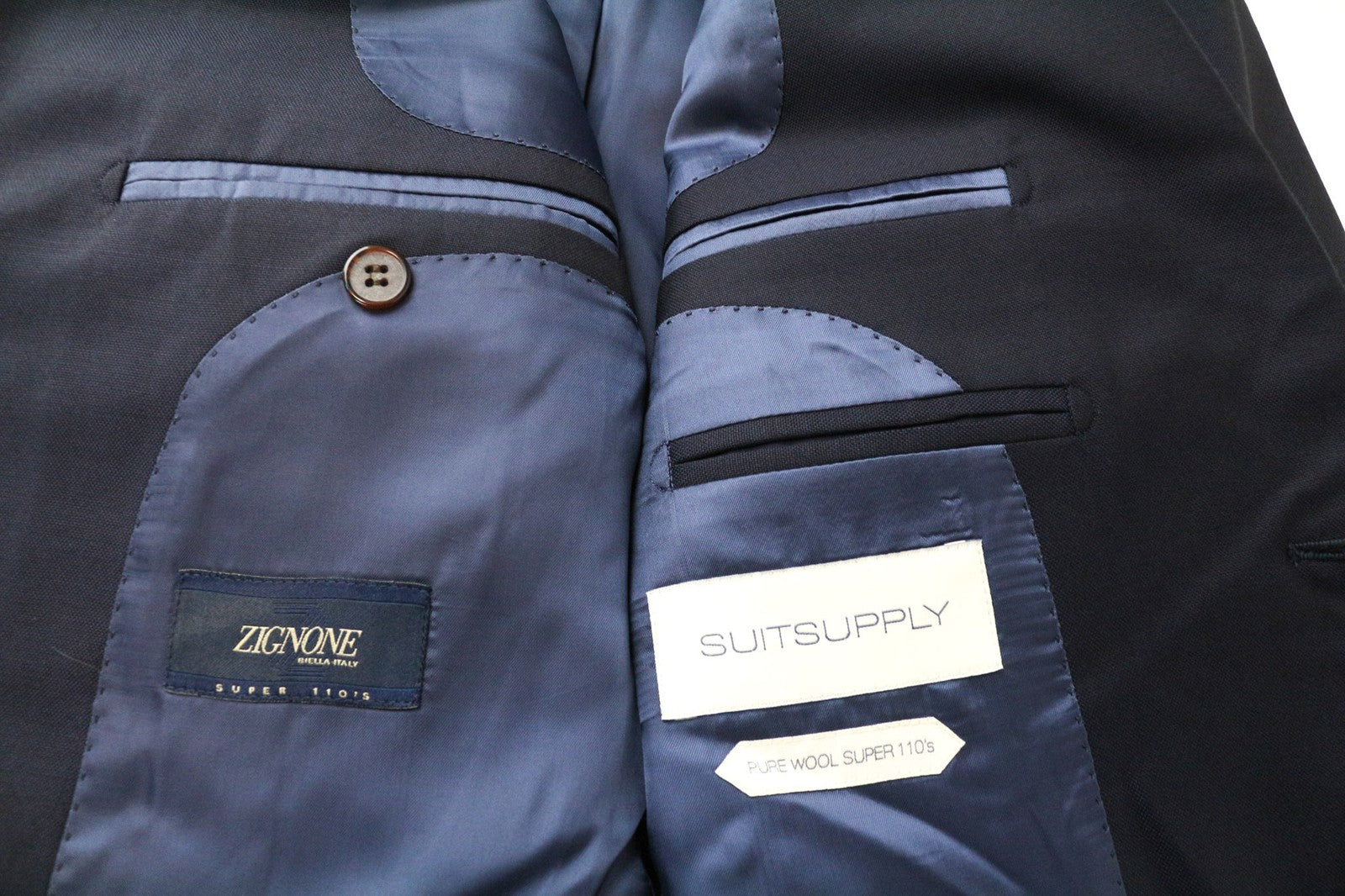 „SUITSUPPLY Napoli“ vyriškas švarkas, UK38R, tamsiai mėlynas, vilnonis „Super 110's Classic“ 