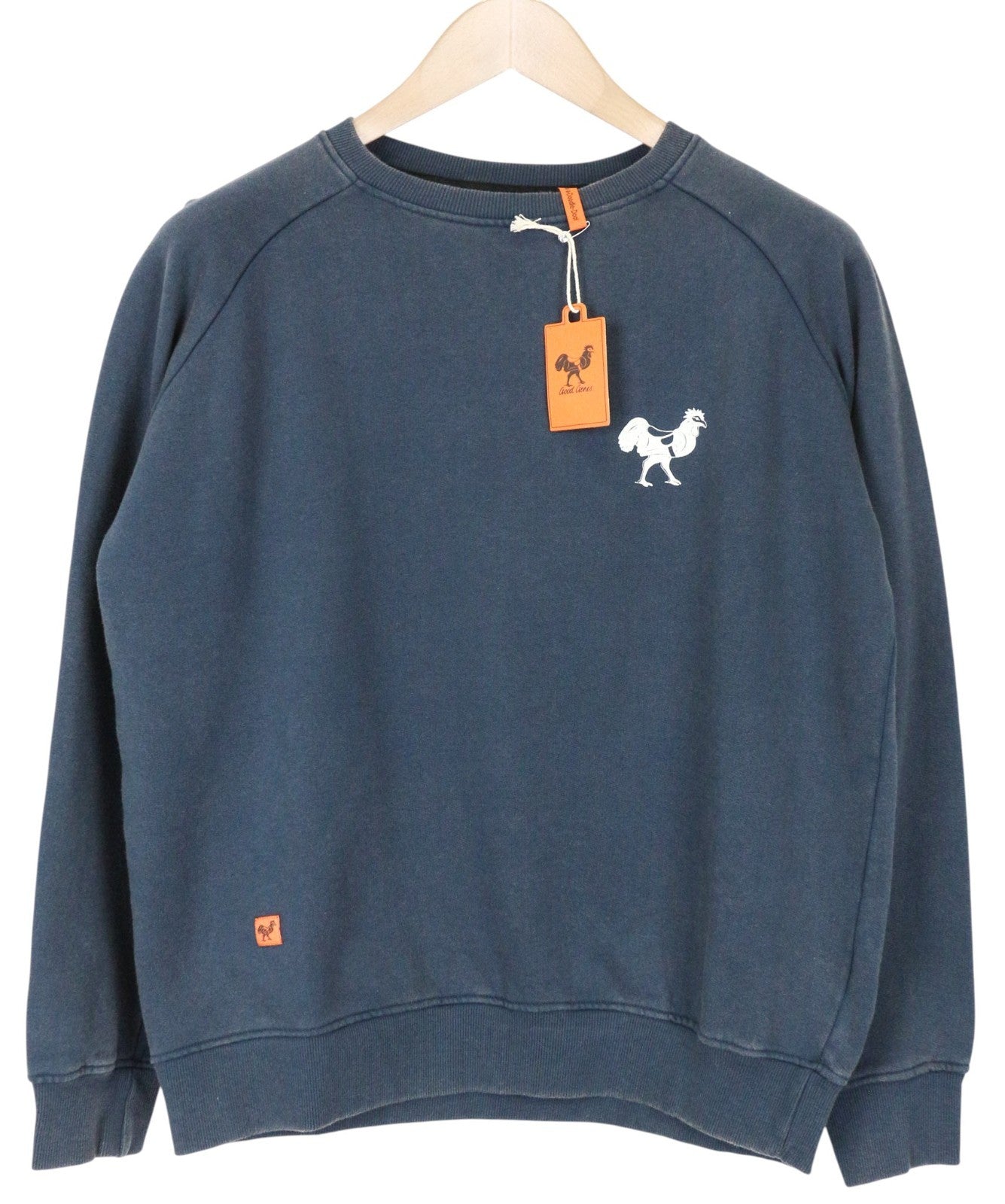 GOOD GENES moteriškas džemperis su mėlynu logotipu ir ilgomis rankovėmis. 