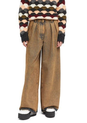 ALANUI Desert Rose plačių klešnių moteriški džinsai W27 klostėmis dažytos abrikosinės spalvos džinsinės kelnės RRP550 