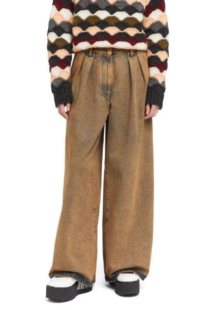 ALANUI Desert Rose plačių klešnių moteriški džinsai W27 klostėmis dažytos abrikosinės spalvos džinsinės kelnės RRP550 