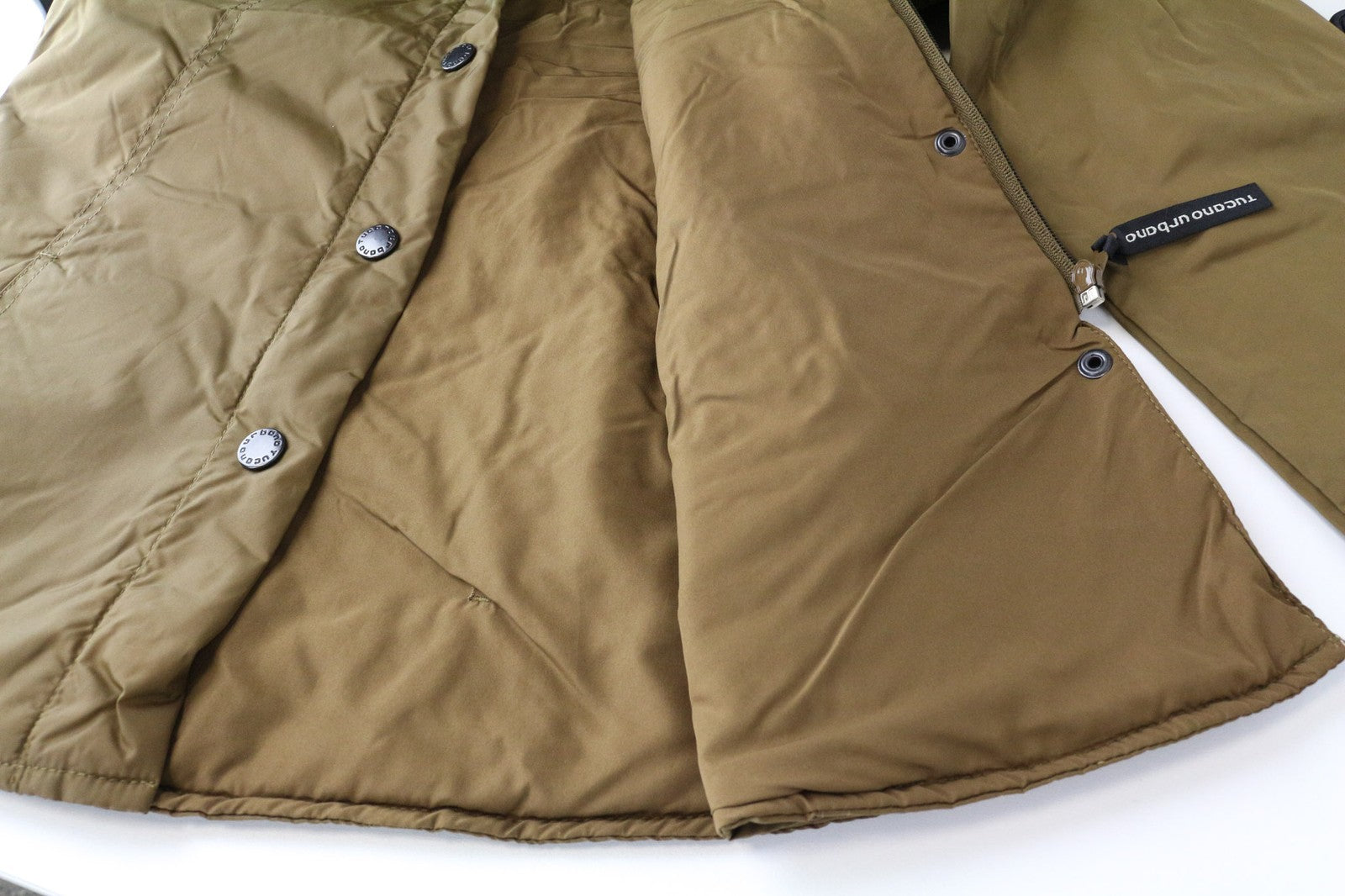 TUCANO URBANO Lori moteriškos XS dydžio rudos, vėjui atsparios, laisvalaikio stiliaus, vienaeilės, megztos. 