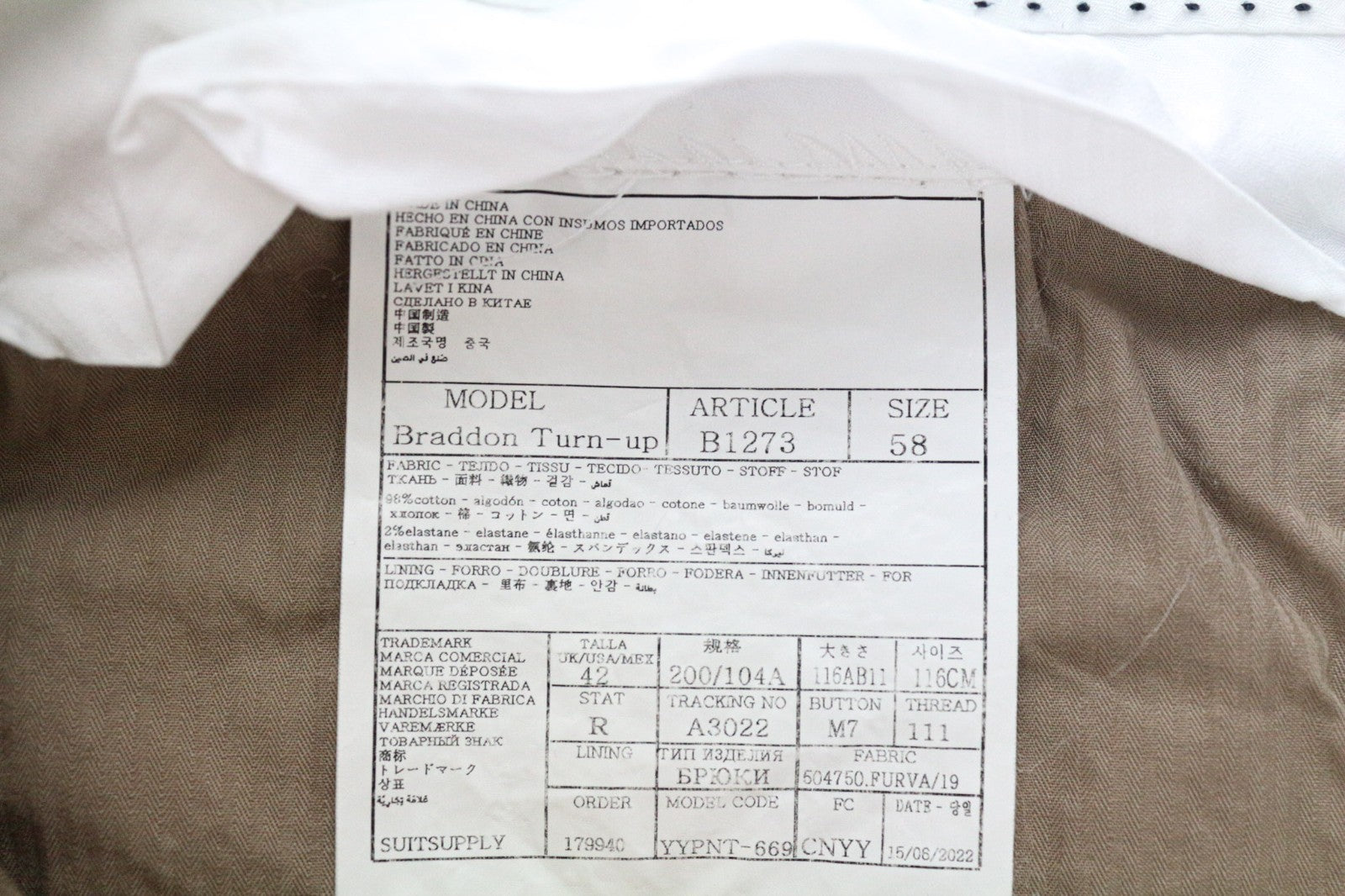 SUITSUPPLY Braddon vyriškos kelnės, UK42R, balkšvos, tamprios medvilnės kelnės su atlenkiamu apvadu 