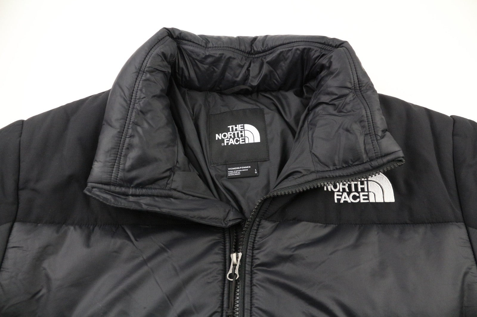 „THE NORTH FACE“ moteriška „Himalayan Parka“ su izoliacija ir pamušalu, juoda striukė aukštu kaklu. 