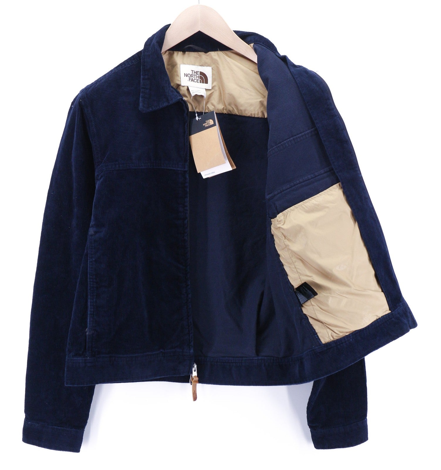 „THE NORTH FACE“ vyriška velveto striukė su mėlyna užtrauktuku ir organiniu polo kaklu. 