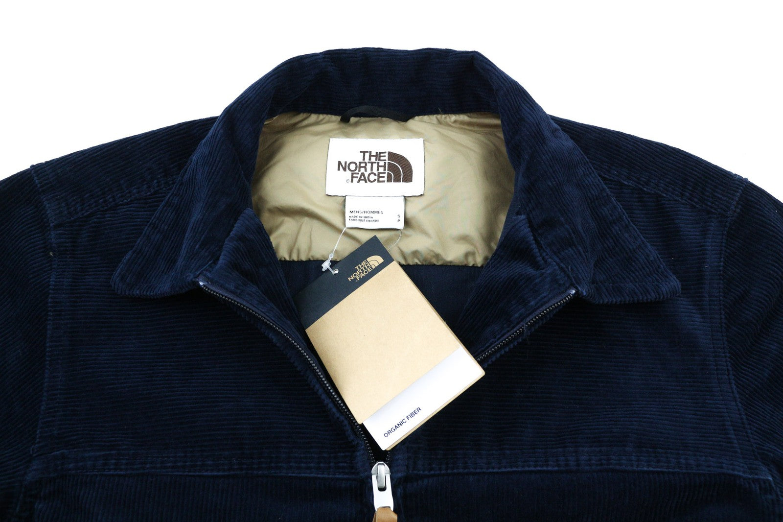 „THE NORTH FACE“ vyriška velveto striukė su mėlyna užtrauktuku ir organiniu polo kaklu. 